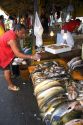 Vendors selling fish at a market in Manaus, Brazil.