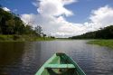 The bow of a dugout canoe on the Arasa River in the Amazon jungle near Manaus, Brazil.