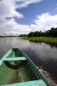 The bow of a dugout canoe on the Arasa River in the Amazon jungle near Manaus, Brazil.
