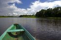 The bow of a dugout canoe on the Arasa River in the Amazon jungle near Manaus, Brazil.