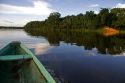 The bow of a dugout canoe on the Arasa River in the Amazon jungle near Manaus, Brazil.
