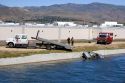 Fire department divers pull a car from an irrigation canal in Boise, Idaho.