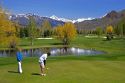 Golfing in Sun Valley, Idaho with the Boulder Mountains in the background.