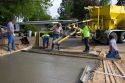 Workers pouring a cement driveway in Boise, Idaho.