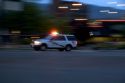 Emergency vehicle in motion with lights on in Boise, Idaho.