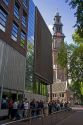 People wait in line to visit the Anne Frank House in Amsterdam, Netherlands.