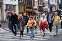 Pedestrians crossing the street in Amsterdam, Netherlands.