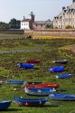 Low tide in the harbor at the village of Barfleur in the region of Basse-Normandie, France.