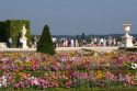 Tourists visit the formal gardens of The Palace of Versailles at Versailles in the department of Yvelines, France.