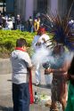 Aztec indians in traditional dress perform a spiritual ceremony with smoke on the Day of the Dead in Mexico City, Mexico.