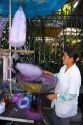 Mexican street vendor making cotton candy in Chapultepec Park in Mexico City, Mexico.