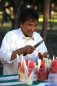 Mexican street vendor selling fresh fruit cups in Mexico City, Mexico.