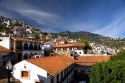 Red tile roofed homes at Taxco in the State of Guerrero, Mexico.