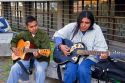 Mexican men playing acoustic guitars in Mexico City, Mexico.