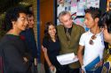 Professor speaking with students on the campus of the National Autonomous University of Mexico in Mexico City, Mexico.