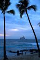 Cruise ship at sunset in the Pacific Ocean off the coast of the Big Island of Hawaii.