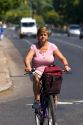 Woman riding a bicycle in Buenos Aires, Argentina.