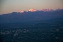 Aerial view of Mendoza and the Andes in Argentina at sunrise through the window of an airplane.