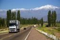 A view of the Andes Mountain Range with traffic on highway 7 near Mendoza, Argentina.