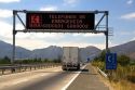 Spanish language road sign giving emergency telephone information, near Santiago, Chile.