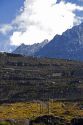 Trucks travel on switchback roads in the Andes Mountain Range in Chile.