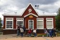 People in front of the tourist information building at Ushuaia on the island of Tierra del Fuego, Argentina.
