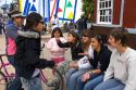 Teens socialize in front of the tourist information center at Ushuaia on the island of Tierra del Fuego, Argentina.