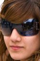 Portrait of a teenage girl wearing sunglasses at Ushuaia on the island of Tierra del Fuego, Argentina.