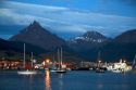 The harbor and city of Ushuaia at dusk on the island of Tierra del Fuego, Argentina.