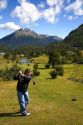 Man playing golf at the Ushuaia Golf Club in the city of Ushuaia on the island of Tierra del Fuego, Argentina.