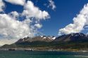 The harbor and city of Ushuaia below the Martial mountain range on the island of Tierra del Fuego, Argentina.