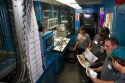 Pressmen in the control room for the rotary printing press at the Houston Chronicle in Houston, Texas.