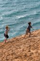 Children play on the dunes of Lake Michigan in Sleeping Bear Dunes National Lakeshore located along the northwest coast of the Lower Peninsula of Michigan.
