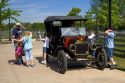 Children play on a Ford Model T in Greenfield Village at The Henry Ford in Dearborn, Michigan.