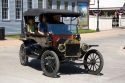 Visitors ride in a Ford Model T on the streets of Greenfield Village at The Henry Ford in Dearborn, Michigan.
