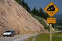 10% grade road sign atop the high mountain Teton Pass on Wyoming Highway 22 near the state border of Wyoming and Idaho.