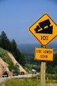 10% grade road sign atop the high mountain Teton Pass on Wyoming Highway 22 near the state border of Wyoming and Idaho.