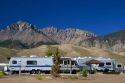 RV camping at the Joe T. Fallini BLM campground below the mountain peaks of the Lost River Range in central Idaho.
