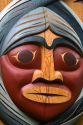 Carved face in a totem pole at Stanley Park in Vancouver, British Columbia, Canada.