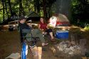 Campers sit next to a campfire in the North Cascades National Park, Washington.