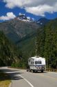 Truck pulling a camper on Washington State Highway 20 in the North Cascade Range, Washington.