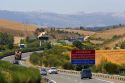 Automobiles travel on the Autopista near Pamplona, Navarre, northern Spain.