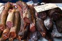 Sausage and cured meat being sold at an outdoor market in the town of Cangas de Onis, Asturias, northern Spain.