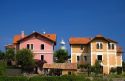 Residential houses and lighthouse in the town of Llanes, Asturias, Spain.