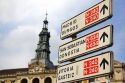 Direction sign and city hall in the city of Bilbao, Biscay, northern Spain.