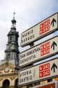Direction sign and city hall in the city of Bilbao, Biscay, northern Spain.