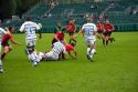 Men play a game of rugby in the city of Bath, Somerset, England.