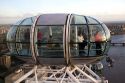 Tourists view the city of London from the London Eye, England.