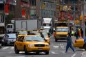 Taxicabs in Times Square, Manhattan, New York City, New York, USA.