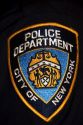 Patch on the arm of a New York City police officer in New York City, New York, USA.